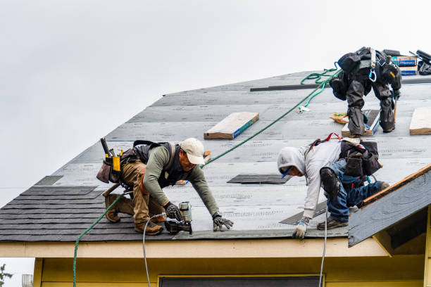 Professional Gutter Installation technician working in Manhasset, NY